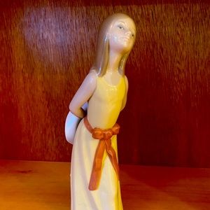Lladro “ Naughty Girl with Sunhat and Ribbon”